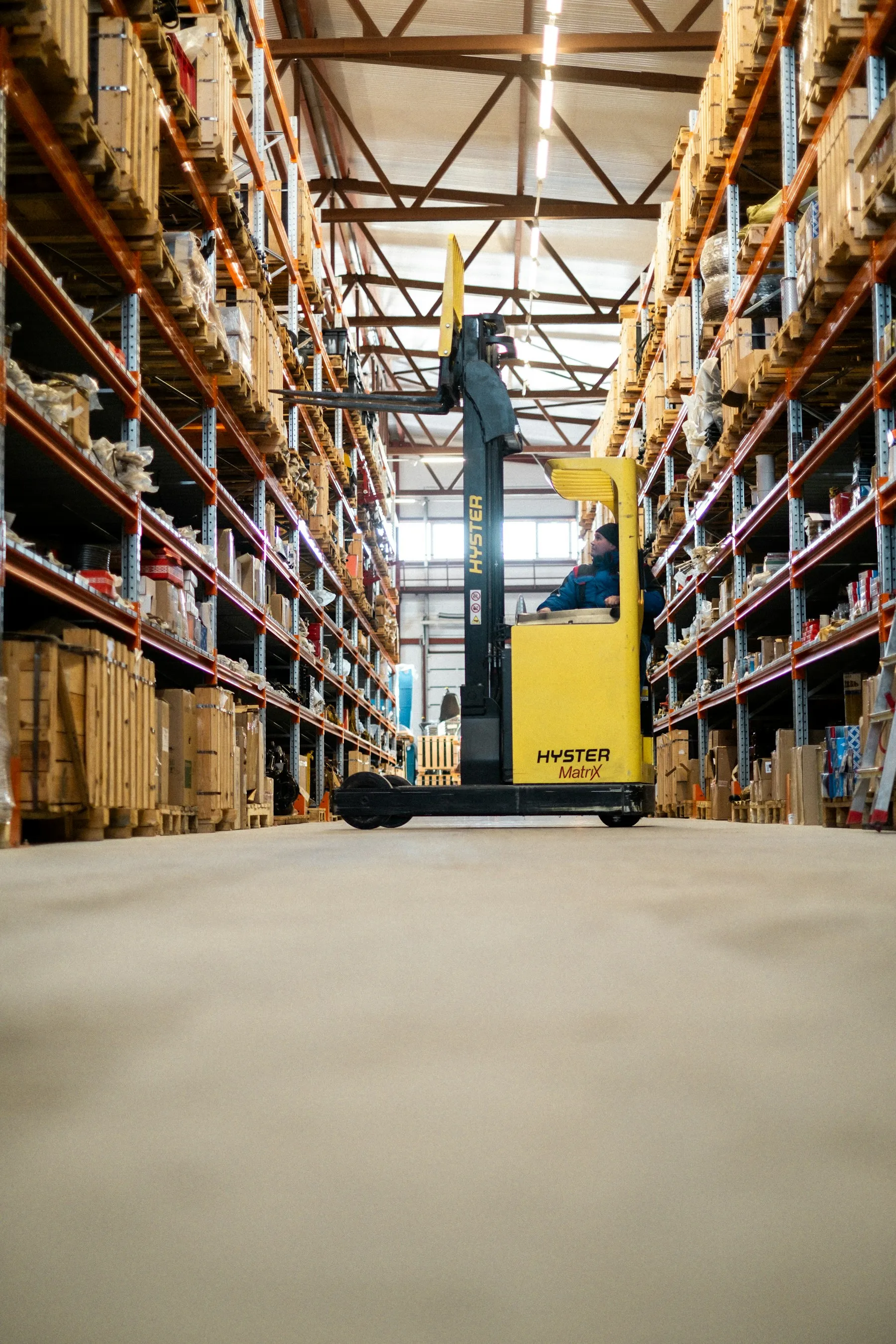 A forklift moving stock through a warehouse